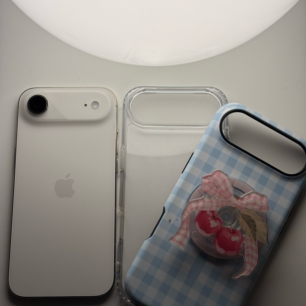 Apple iPhone with Blue Gingham and Cherry Case